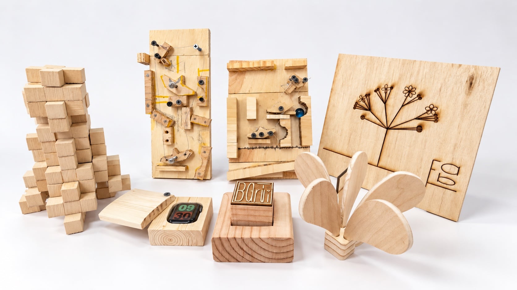 A group of six fabrication projects: a wooden box, shuttlecock, engraved tree panel, APack stamp, cellular structure, and marble-machine prototypes